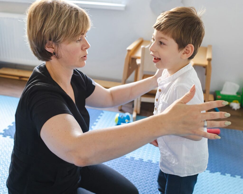 behavior therapist with child
